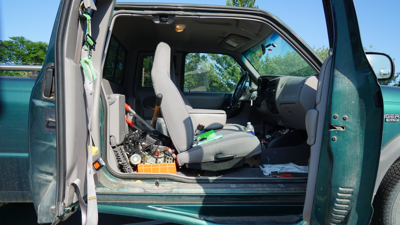 So much junk and filth. Note the seat belt condition.